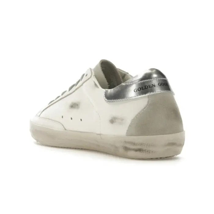 Golden Goose Super-Star with gold glitter star and ice-gray suede inserts