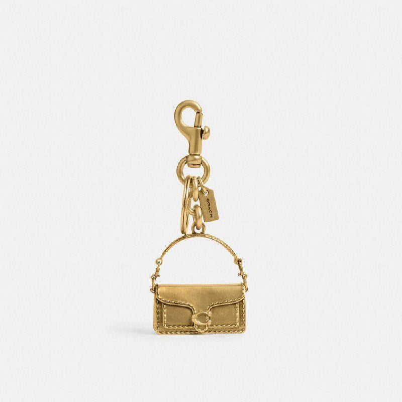 Coach gold tabby charm