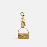 Coach gold tabby charm