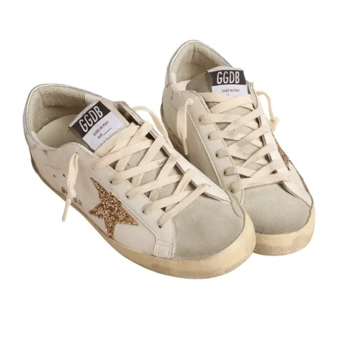 Golden Goose Super-Star with gold sparkle foxing and lettering