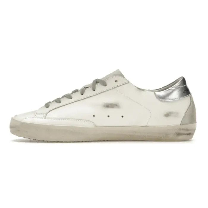 Golden Goose Super-Star with gold glitter star and ice-gray suede inserts
