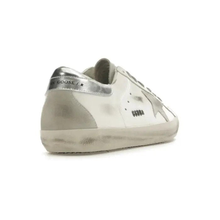 Golden Goose Super-Star with gold glitter star and ice-gray suede inserts