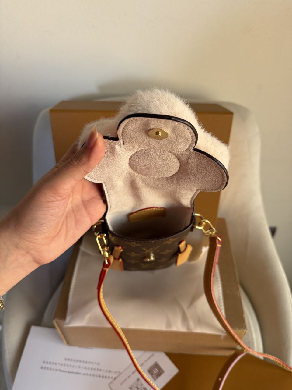 LV vivienne phone pouch