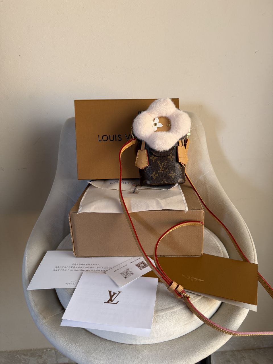 LV vivienne phone pouch