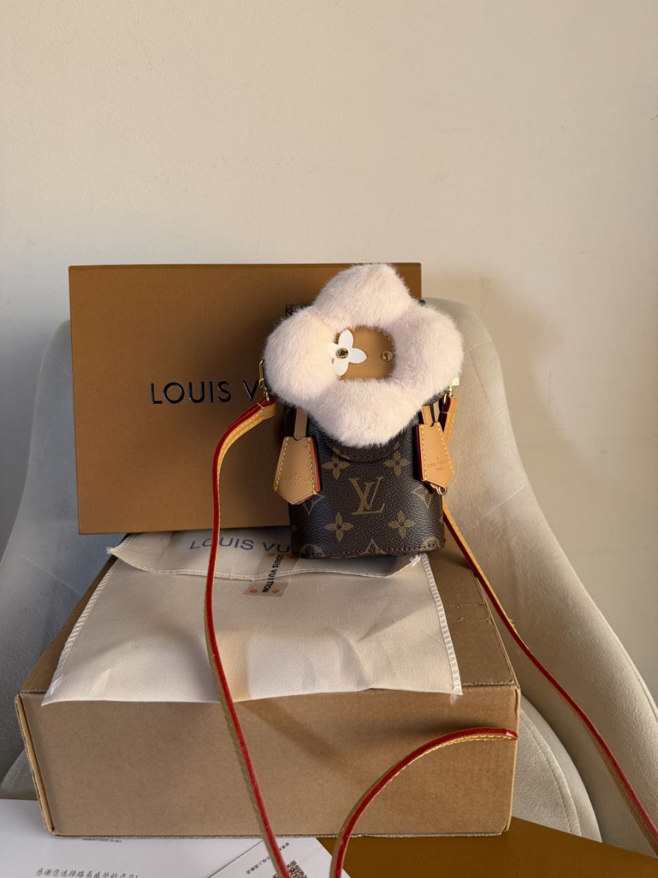 LV vivienne phone pouch