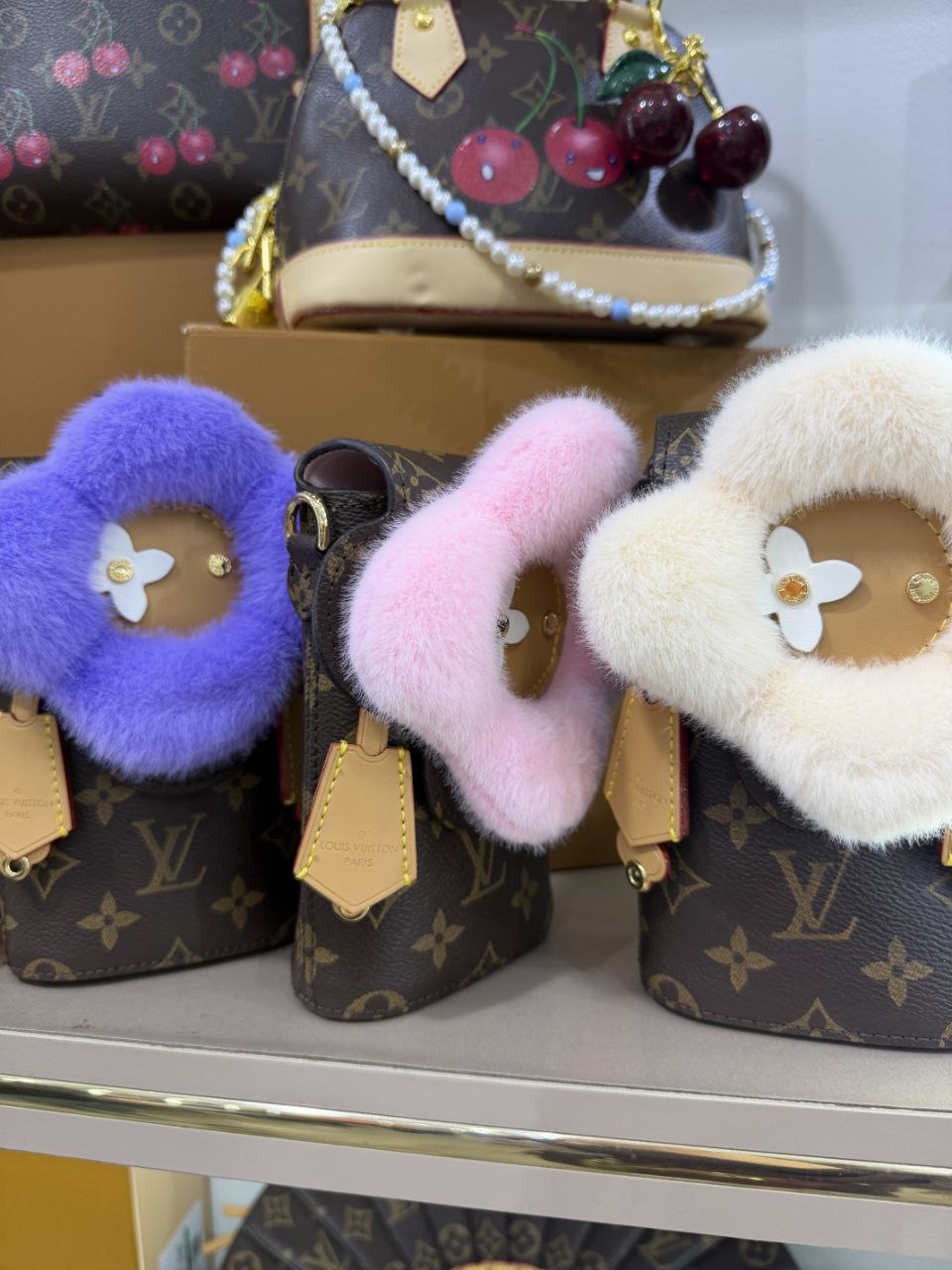 LV vivienne phone pouch