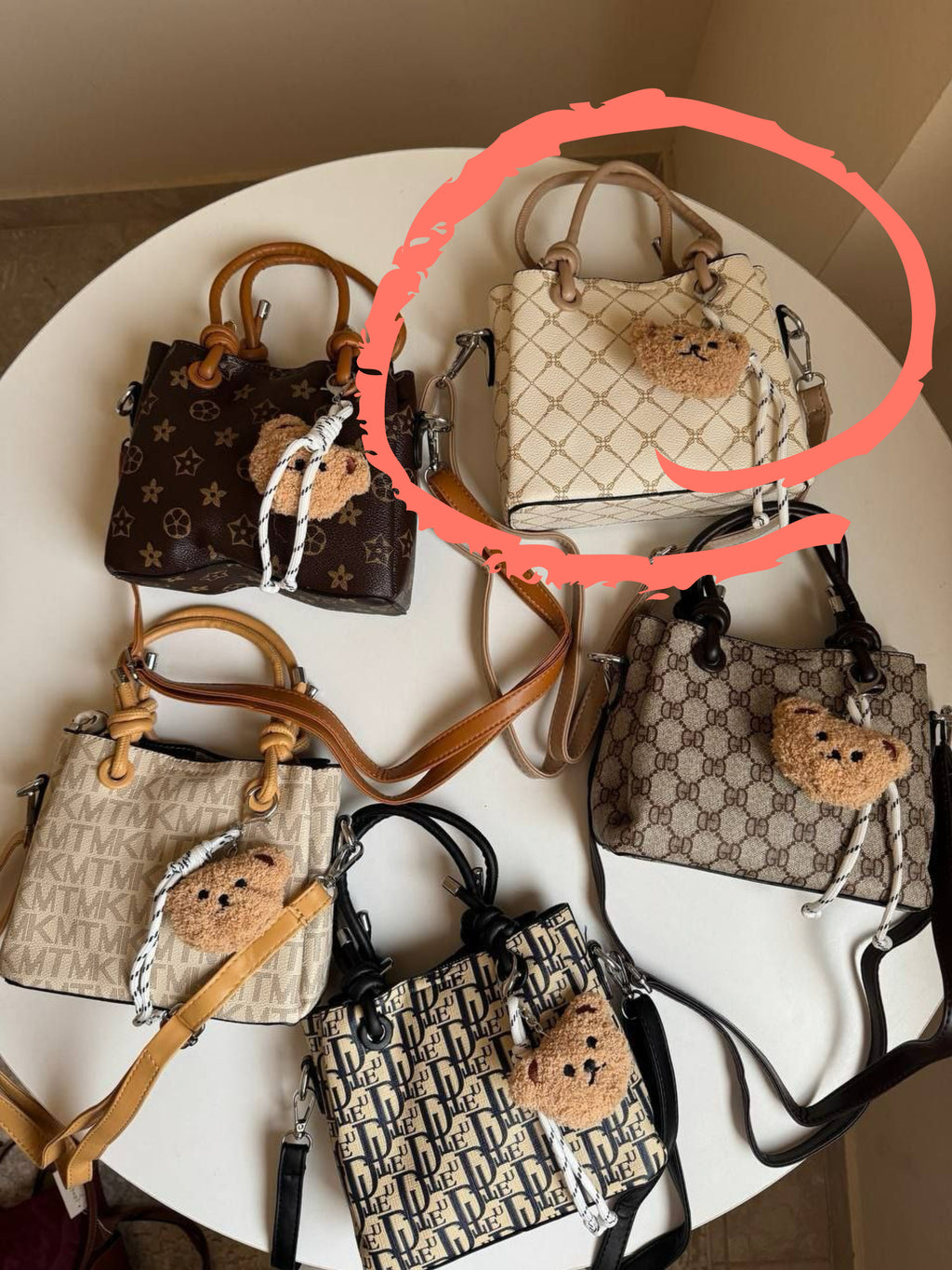 cross bag with bear charm