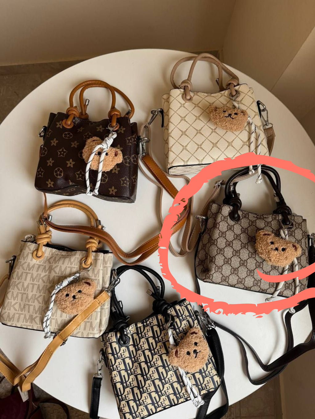 cross bag with bear charm