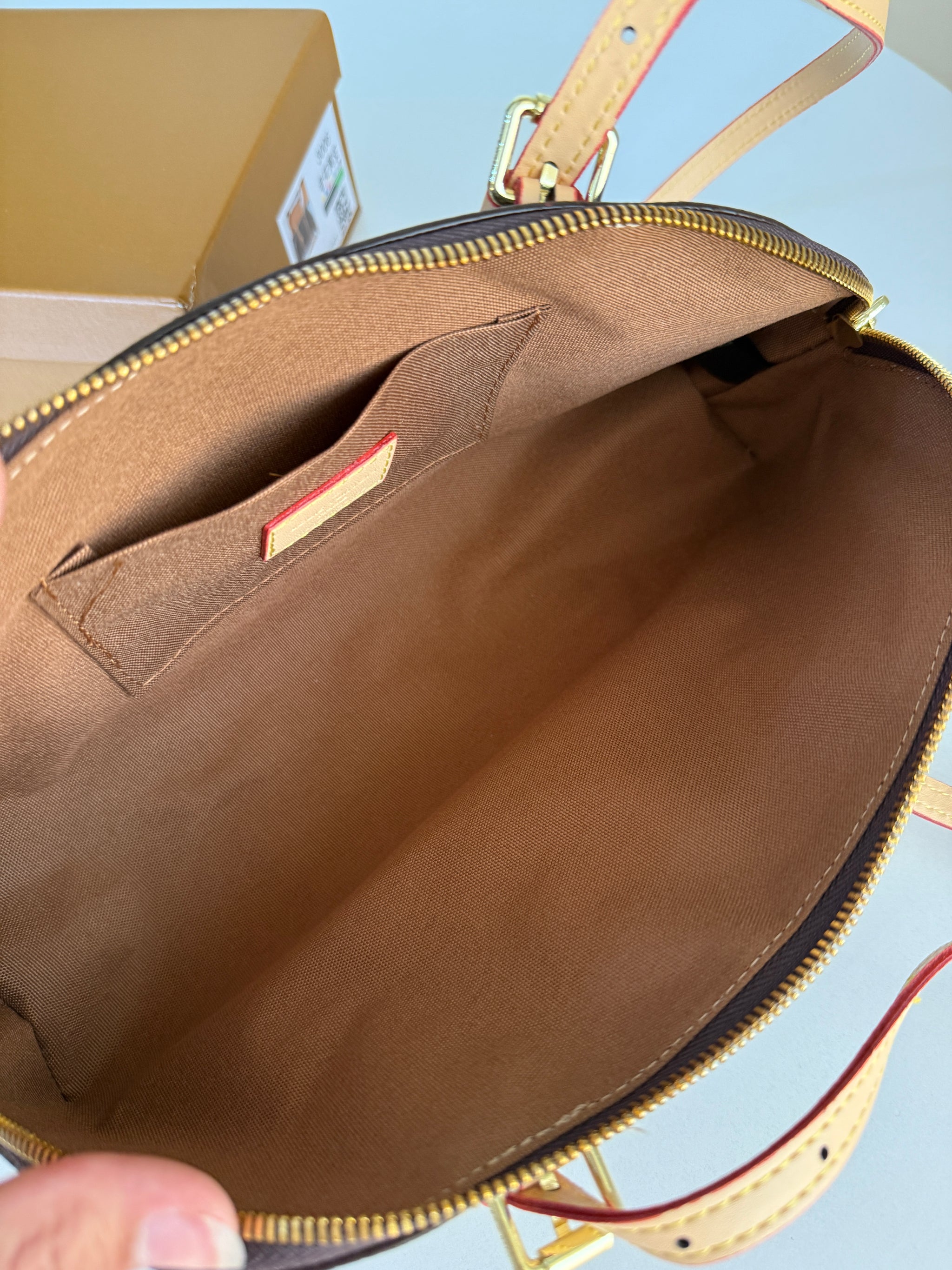Louis Vuitton Squire East West Shoulder bag